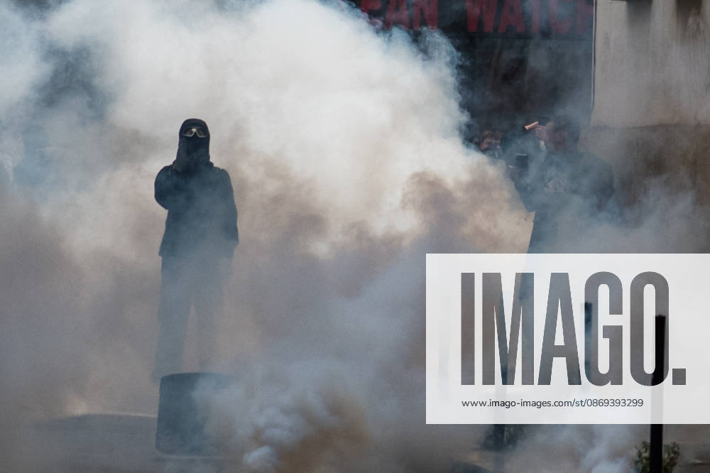 High School Stdent Mobilisation - Bordeaux A protester with their face covered and wearing protective goggles stands in a thick cloud of tear gas during Act V of the high school student mobilisation in Bordeaux, France on October 13, 2026. Photo by Fabrice Sapte ABACAPRESS.COM Bordeaux France