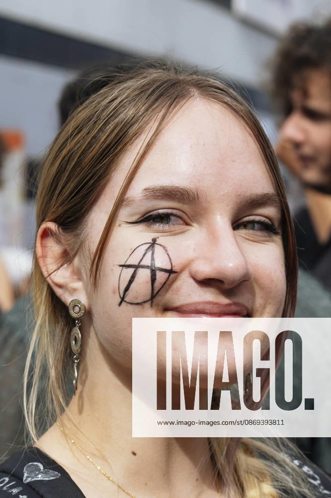 High School Student Mobilisation - Toulouse A young woman with an - A - (for anarchy) on her cheek. Act V of the secondary school and university students protests. Young people and the world of work are continuing their joint mobilisation and demands for adequate resources for education, better study conditions, an end to student precariousness, and access to housing. France, Toulouse, 13 October 2026. Photo by Patricia Huchot-Boissier AbacaPress.com. TOULOUSE OCCITANIE France