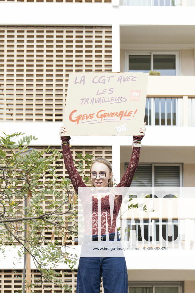 High School Student Mobilisation - Toulouse A young woman holding a placard, the CGT alongside the workers. General strike!., with a block of flats in the background. Act V of the secondary school and university students protests. Young people and the world of work are continuing their joint mobilisation and demands for adequate resources for education, better study conditions, an end to student precariousness, and access to housing. France, Toulouse, 13 October 2026. Photo by Patricia Huchot-Boissier AbacaPress.com. TOULOUSE OCCITANIE France