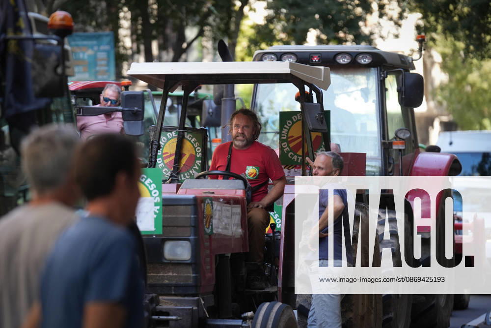 Tractor Rally for Agriculture in Barcelona: Protesters during a rally of tractors from various parts of Catalonia in front of the Government Delegation and statements, on October 14, 2026, in Barcelona, Catalonia, Spain. The demonstration, organized by Unió de Pagesos with the support of Asaja, FCAC, and Revolta Pagesa, denounces the structural crisis in the agricultural sector in Barcelona. October 14, 2026, Spain