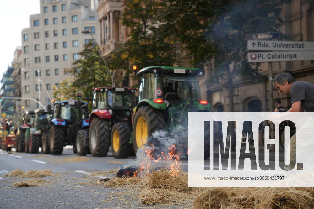 Tractor Rally for Agriculture in Barcelona: Protesters during a rally of tractors from various parts of Catalonia in front of the Government Delegation and statements, on October 14, 2026, in Barcelona, Catalonia, Spain. The demonstration, organized by Unió de Pagesos with the support of Asaja, FCAC, and Revolta Pagesa, denounces the structural crisis in the agricultural sector in Barcelona. October 14, 2026, Spain