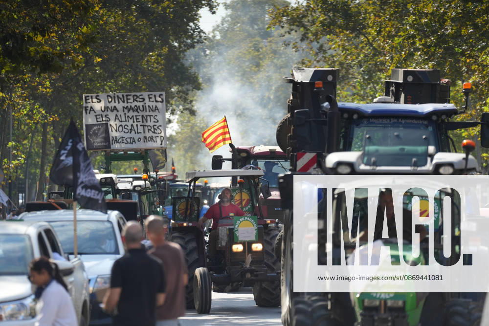 Tractor Rally for Agriculture in Barcelona: Protesters during a rally of tractors from various parts of Catalonia in front of the Government Delegation and statements, on October 14, 2026, in Barcelona, Catalonia, Spain. The demonstration, organized by Unió de Pagesos with the support of Asaja, FCAC, and Revolta Pagesa, denounces the structural crisis in the agricultural sector in Barcelona. October 14, 2026, Spain