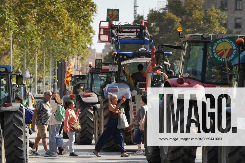 Tractor Rally for Agriculture in Barcelona: Protesters during a rally of tractors from various parts of Catalonia in front of the Government Delegation and statements, on October 14, 2026, in Barcelona, Catalonia, Spain. The demonstration, organized by Unió de Pagesos with the support of Asaja, FCAC, and Revolta Pagesa, denounces the structural crisis in the agricultural sector in Barcelona. October 14, 2026, Spain