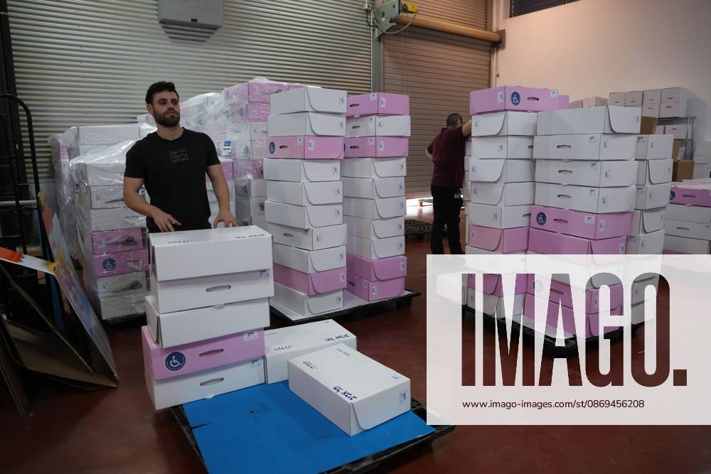 Israel Prepares For Parliamentary Elections SHOHAM, ISRAEL, OCTOBER 14, 2026: Preparations for Israels upcoming parliamentary elections at the Central Elections Committees logistics centre in Shoham. Workers organise and pack voting materials and polling station equipment during a media tour of the facility. SHOHAM Israel