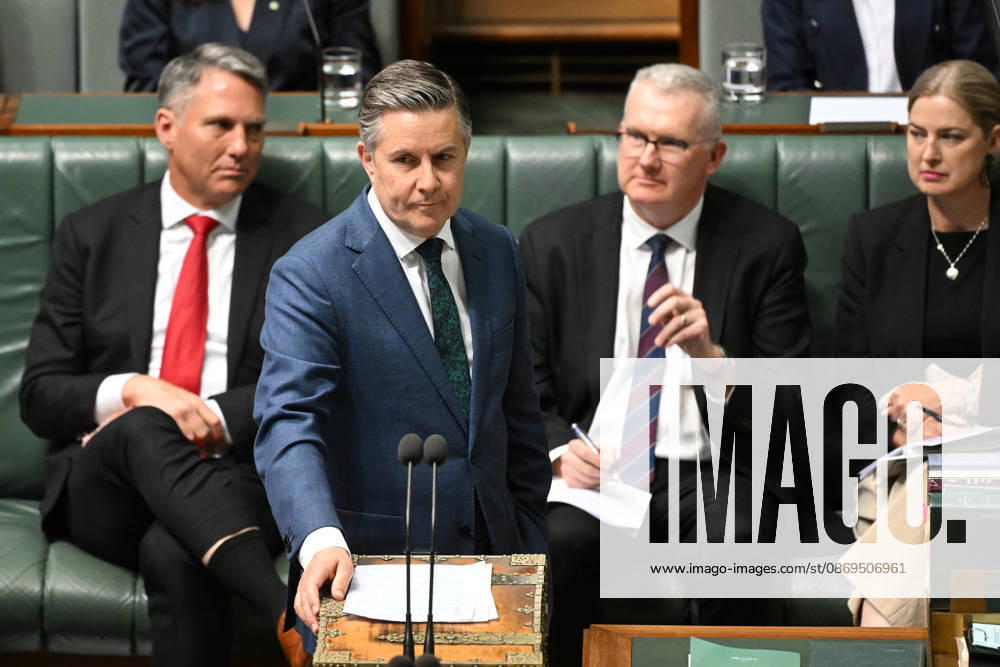 QUESTION TIME, Australian Health Minister Mark Butler speaks to Australian Communications Minister Anika Wells during Question Time in the House of Representatives at Parliament House in Canberra, Thursday, October 15, 2026. ( NO ARCHIVING CANBERRA AUSTRALIAN CAPITAL TERRITORY Australia