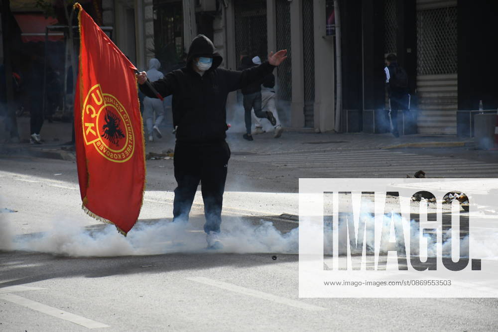 Student protests demanding improved educational conditions continue in Albania TIRANA, ALBANIA - OCTOBER 15: A masked protester stands amid clouds of tear gas during clashes with police on the third day of demonstrations demanding improved educational conditions in Tirana, Albania, on October 15, 2026. University students are joined by high school students and local residents as police use tear gas to disperse demonstrators outside the Ministry of Education and the Parliament building, while protesters throw stones and other objects at police officers. Olsi Shehu Anadolu Tirana Albania. Editorial use only. Please get in touch for any other usage.