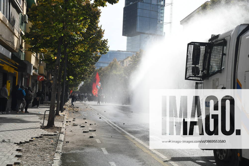 Student protests demanding improved educational conditions continue in Albania TIRANA, ALBANIA - OCTOBER 15: A police water cannon sprays water toward demonstrators during the third day of protests demanding improved educational conditions in Tirana, Albania, on October 15, 2026. University students are joined by high school students and local residents as tensions escalate, with police using tear gas to disperse demonstrators outside the Ministry of Education and the Parliament building, while protesters throw stones and other objects at police officers. Olsi Shehu Anadolu Tirana Albania. Editorial use only. Please get in touch for any other usage.