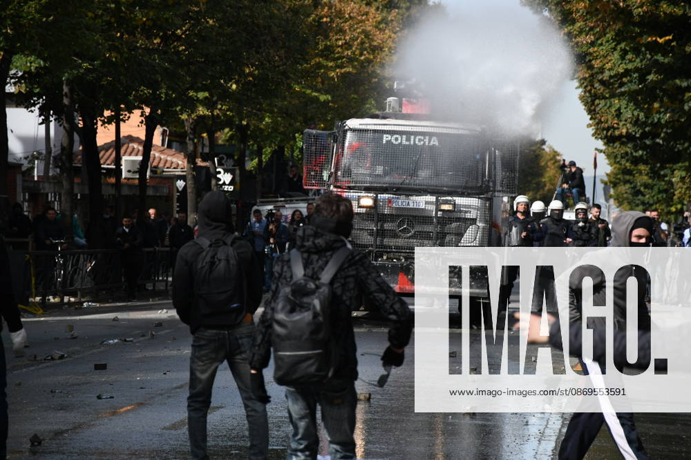 Student protests demanding improved educational conditions continue in Albania TIRANA, ALBANIA - OCTOBER 15: A police water cannon sprays water toward demonstrators during the third day of protests demanding improved educational conditions in Tirana, Albania, on October 15, 2026. University students are joined by high school students and local residents as tensions escalate, with police using tear gas to disperse demonstrators outside the Ministry of Education and the Parliament building, while protesters throw stones and other objects at police officers. Olsi Shehu Anadolu Tirana Albania. Editorial use only. Please get in touch for any other usage.
