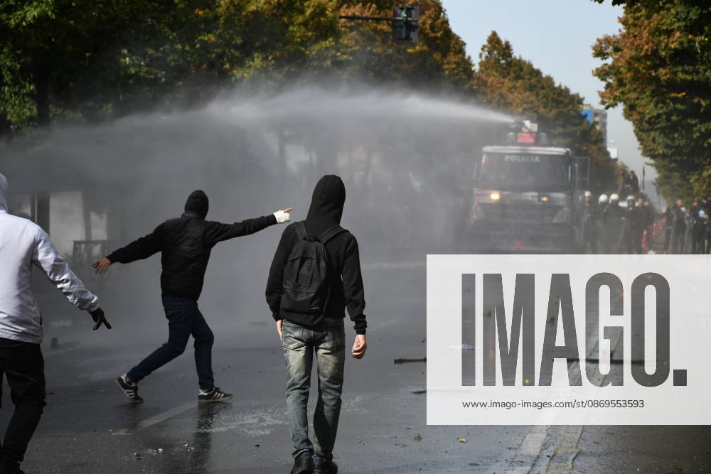 Student protests demanding improved educational conditions continue in Albania TIRANA, ALBANIA - OCTOBER 15: A police water cannon sprays water toward demonstrators during the third day of protests demanding improved educational conditions in Tirana, Albania, on October 15, 2026. University students are joined by high school students and local residents as tensions escalate, with police using tear gas to disperse demonstrators outside the Ministry of Education and the Parliament building, while protesters throw stones and other objects at police officers. Olsi Shehu Anadolu Tirana Albania. Editorial use only. Please get in touch for any other usage.