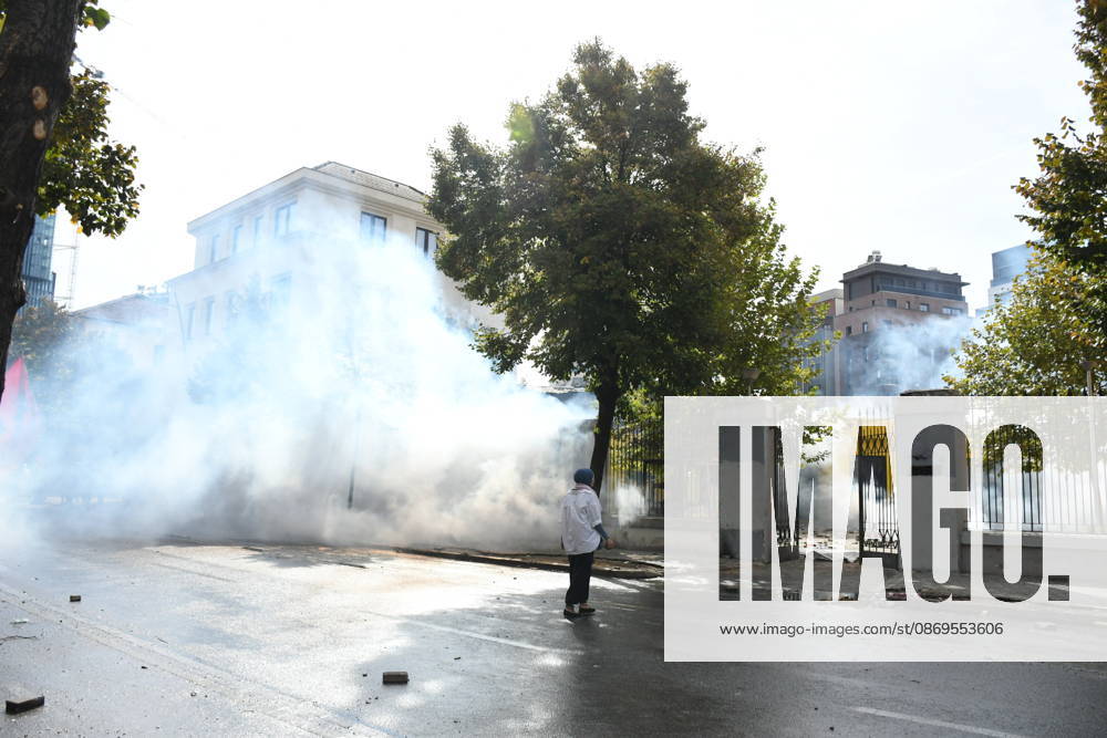 Student protests demanding improved educational conditions continue in Albania TIRANA, ALBANIA - OCTOBER 15: Thick clouds of tear gas fill a street during clashes between protesters and police on the third day of demonstrations demanding improved educational conditions in Tirana, Albania, on October 15, 2026. University students are joined by high school students and local residents as tensions escalate, with police using tear gas to disperse demonstrators outside the Ministry of Education and the Parliament building, while protesters throw stones and other objects at police officers. Olsi Shehu Anadolu Tirana Albania. Editorial use only. Please get in touch for any other usage.