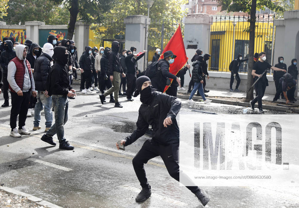 Protesters Clash with Police During a Demonstration in Tirana, Albania. Protesters throw stones at riot police during an anti-government demonstration in central Tirana on October 15, 2026, as protests continued for a third consecutive day over university conditions and demands for the resignation of Albanian Prime Minister Edi Rama. The latest rally follows two nights of violence in the capital, during which protesters and riot police clashed, police used water cannons and tear gas, and demonstrators damaged government offices and shops and set fire to several buildings. Light Studio Agency Malton Dibra Tirana Albania