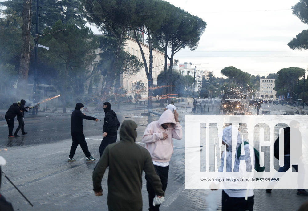 Protesters Clash with Police During a Demonstration in Tirana, Albania. Protesters throw stones at riot police during an anti-government demonstration in central Tirana on October 15, 2026, as protests continued for a third consecutive day over university conditions and demands for the resignation of Albanian Prime Minister Edi Rama. The latest rally follows two nights of violence in the capital, during which protesters and riot police clashed, police used water cannons and tear gas, and demonstrators damaged government offices and shops and set fire to several buildings. Light Studio Agency Malton Dibra Tirana Albania