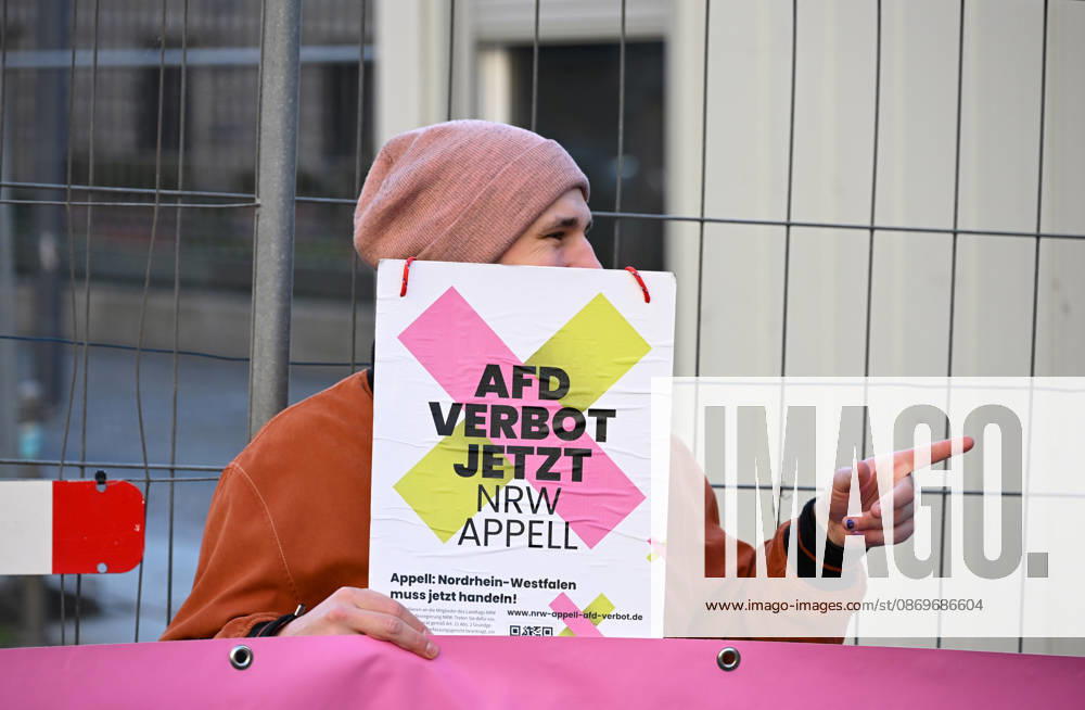 Rally calling for an AfD ban in Berlin BERLIN, GERMANY - OCTOBER 16: People take part in a rally near the Bundesrat calling for proceedings to ban the far-right Alternative for Germany (AfD) party and urge North Rhine-Westphalia Minister-President Hendrik Wüst to support their demand, as he is set to be elected President of the Bundesrat that day, in Berlin, Germany, on 16 October 2026. The rally is organized by the alliance NRW Appeal: AfD Ban Now, which reportedly collected more than 120,000 signatures in support of an AfD ban in North Rhine-Westphalia and is urging the Bundesrat to initiate proceedings before the Federal Constitutional Court to ban the party. Volodymyr Sindieiev Anadolu Berlin Germany. Editorial use only. Please get