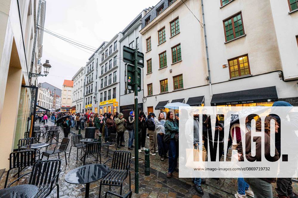 People pictured in the queue ahead of the Angele Instinct Release Party , a surprise party organized by the Brussels singer to celebrate the release of her album Instinct at the Grote Markt Grand Place, in Brussels, Friday 16 October 2026. EMILExWINDAL 190006189