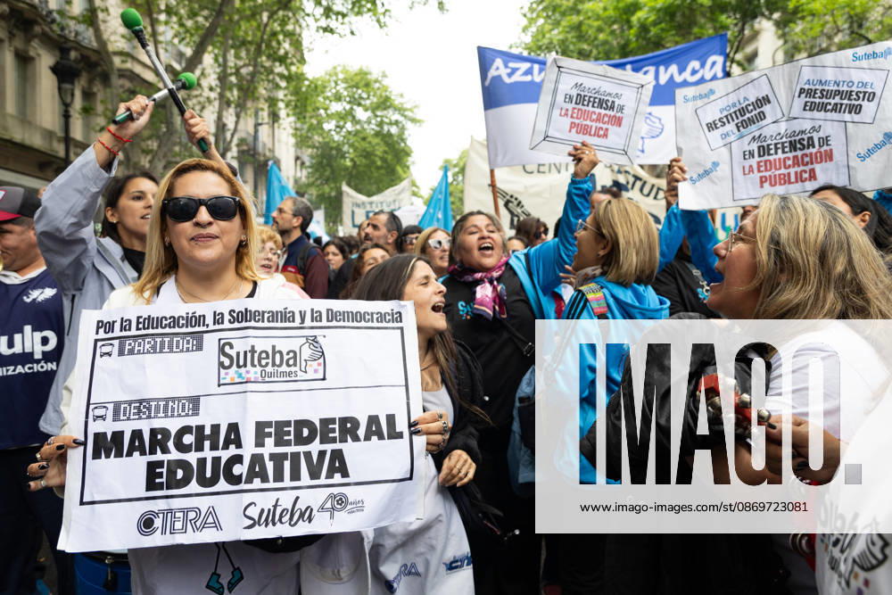 Teachers sing during the march towards Argentinas National Congress to demand compliance with the University Budget Law. Buenos Aires Argentina - ZUMAp265 20261016_zip_p265_038