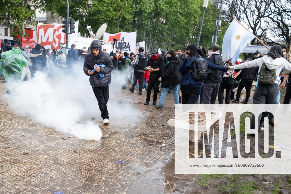 Tear gas canisters fall over Plaza de los Dos Congresos during clashes between protesters and police. Buenos Aires Argentina - ZUMAp265 20261016_zip_p265_050
