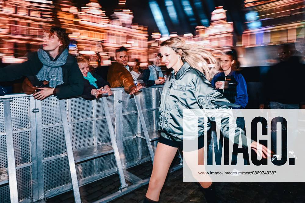 Belgian singer Angele pictured during the Angele Instinct Release Party , a surprise party organized by the Brussels singer to celebrate the release of her album Instinct at the Grote Markt Grand Place, in Brussels, Friday 16 October 2026. EMILExWINDAL 190036500