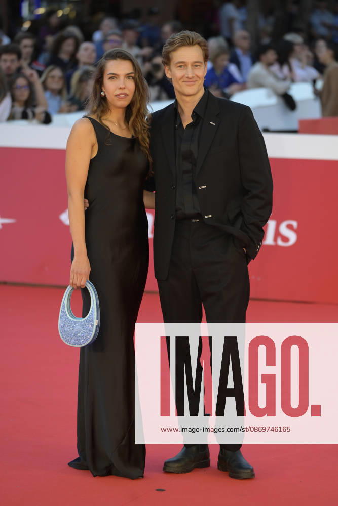 Alexander Fehling (r and new girl friend (r) attend the red carpet for the film LEurotrashi at the 2026 Rome Film Fest, held at the Auditorium Parco della Musica. Rome Italy - ZUMAs197 20261016_aaa_s197_307