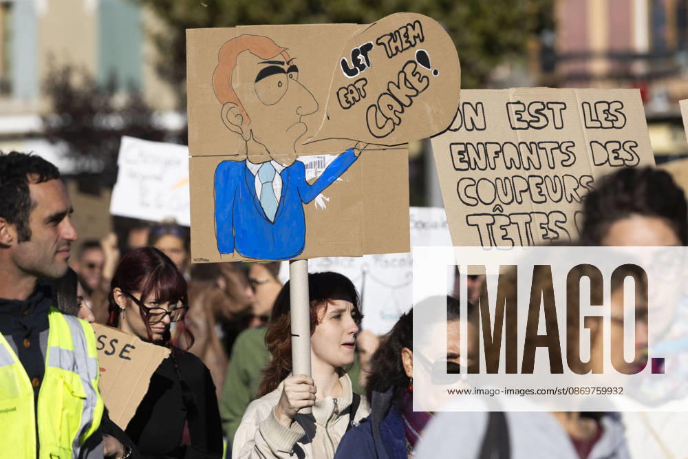 High Cost of Living Protest - Gap A demonstrator carries a caricature beside a placard reading On est les enfants des coupeurs de têtes ! ( We are the children of the head-cutters! ) during the march in Gap, France, on October 17, 2026. Photo by Thibaut Durand ABACAPRESS.COM Gap Provence-Alpes-Cote d Azur France