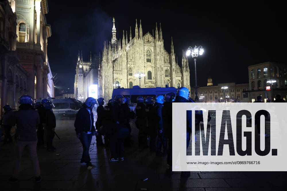 IPA89813364 - Milan, October 17, 2026: Italia in Piazza demonstration; violent clashes between police and the student movement; a construction site in Piazza Duomo set on fire