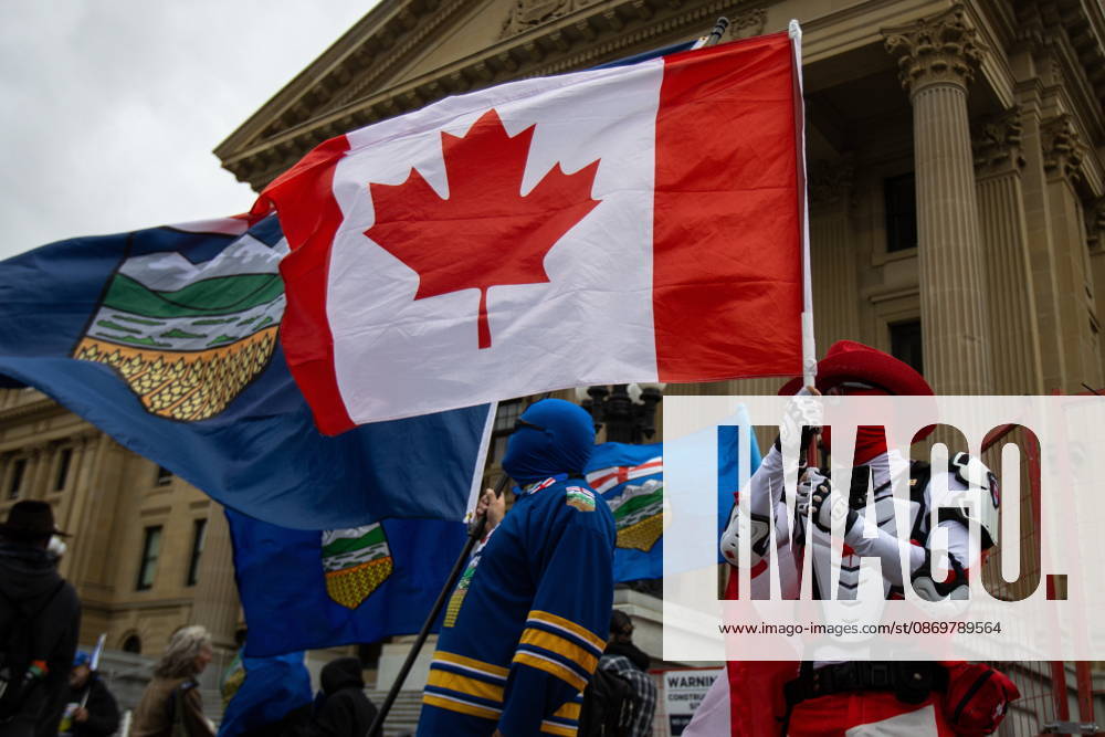 Canada Guy waves a Canadian flag during an Alberta independence rally at the Alberta legislature, in Edmonton on Saturday, Oct. 17, 2026. Edmonton Canada - ZUMAc35_ 20261017_zaf_c35_033