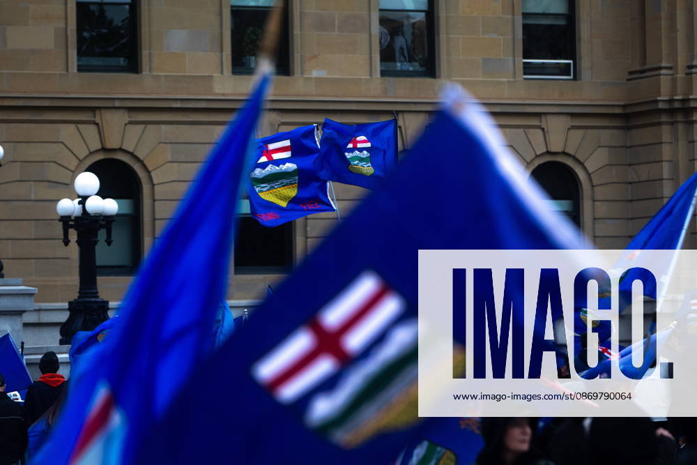 Flags wave in the wind during an Alberta independence rally at the Alberta legislature, in Edmonton on Saturday, Oct. 17, 2026. Edmonton Canada - ZUMAc35_ 20261017_zaf_c35_035