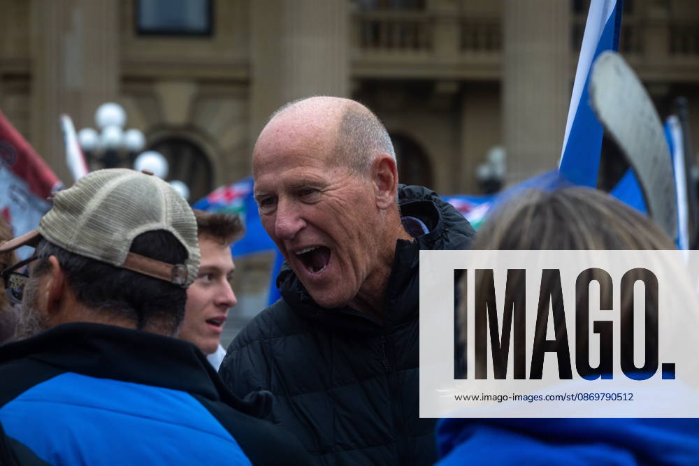 Mitch Sylvestre chats with attendees during an Alberta independence rally at the Alberta legislature, in Edmonton on Saturday, Oct. 17, 2026. Edmonton Canada - ZUMAc35_ 20261017_zaf_c35_039
