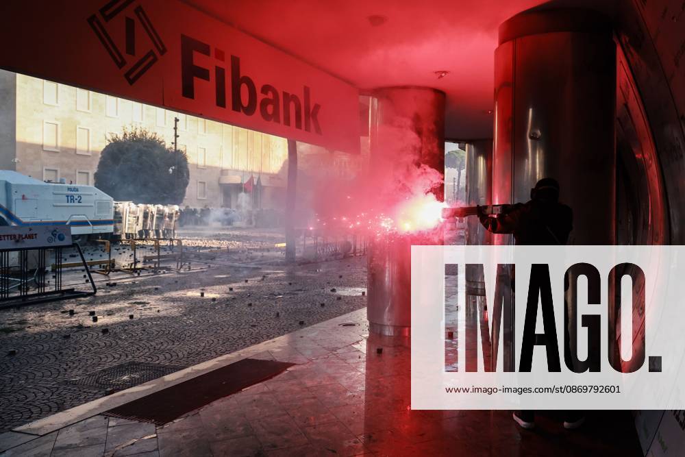 Fires And Clashes In Tirana TIRANA, ALBANIA, OCTOBER 17, 2026: Demonstrators clash with riot police near the Prime Ministers Office during student-led anti-government protests in central Tirana. Protesters throw stones and pyrotechnics, while police use tear gas, water cannons and rubber bullets. Fires break out at the High Court and the entrance to a Bank of Albania building as unrest continues for a fifth consecutive day. Demonstrators demand better university conditions and the resignation of Prime Minister Edi Rama. Tirana Albania