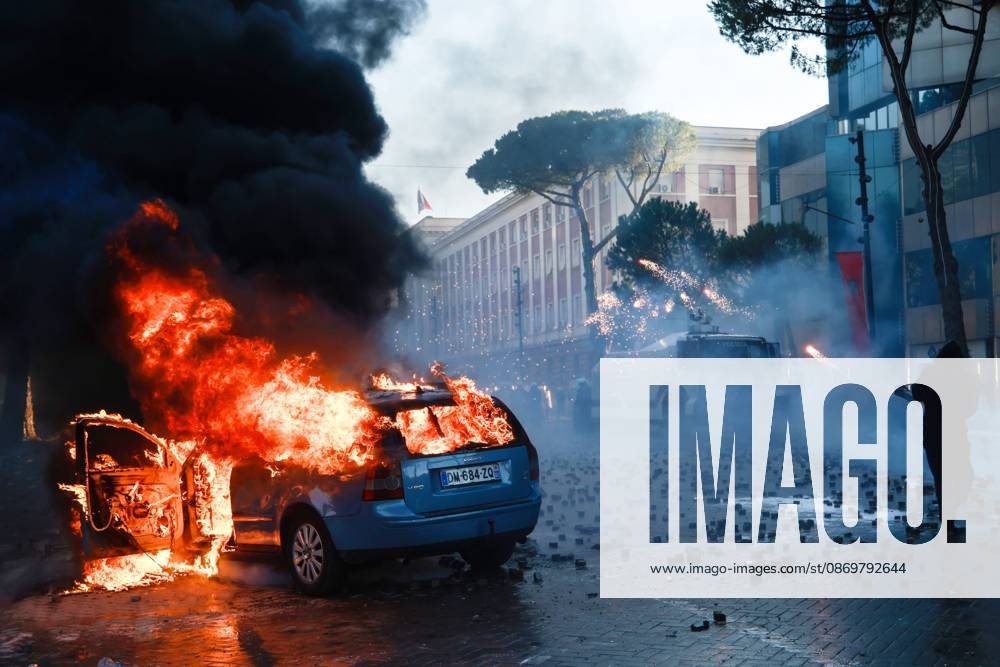Fires And Clashes In Tirana TIRANA, ALBANIA, OCTOBER 17, 2026: Demonstrators clash with riot police near the Prime Ministers Office during student-led anti-government protests in central Tirana. Protesters throw stones and pyrotechnics, while police use tear gas, water cannons and rubber bullets. Fires break out at the High Court and the entrance to a Bank of Albania building as unrest continues for a fifth consecutive day. Demonstrators demand better university conditions and the resignation of Prime Minister Edi Rama. Tirana Albania