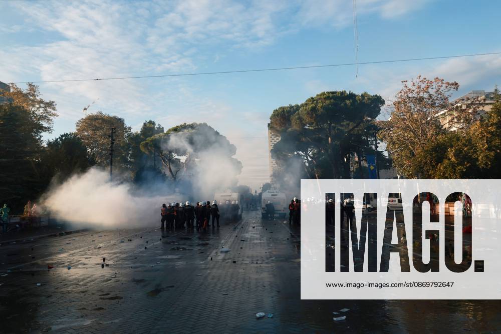 Fires And Clashes In Tirana TIRANA, ALBANIA, OCTOBER 17, 2026: Demonstrators clash with riot police near the Prime Ministers Office during student-led anti-government protests in central Tirana. Protesters throw stones and pyrotechnics, while police use tear gas, water cannons and rubber bullets. Fires break out at the High Court and the entrance to a Bank of Albania building as unrest continues for a fifth consecutive day. Demonstrators demand better university conditions and the resignation of Prime Minister Edi Rama. Tirana Albania
