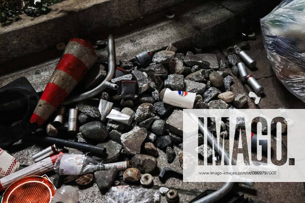 IPA89830550 - Milan: Damage caused by clashes between protesters and police during the Italia in Piazza demonstration against the high cost of living in the city center. Pictured: Damage in Piazza del Duomo