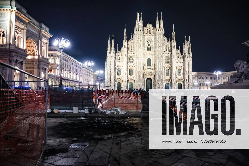 IPA89830551 - Milan: Damage caused by clashes between protesters and police during the Italia in Piazza demonstration against the high cost of living in the city center. Pictured: Damage in Piazza del Duomo