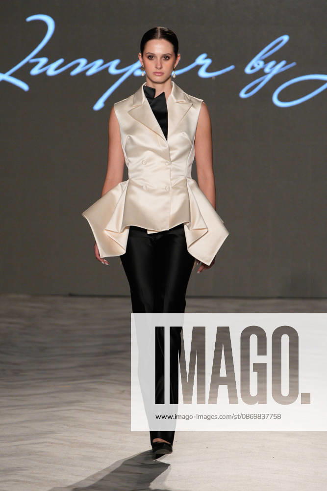 (261018) -- VANCOUVER, Oct. 18, 2026 -- A model presents a creation by Chinese fashion designer Jumper Zhang during Vancouver Fashion Week 2026 in Vancouver, British Columbia, Canada, on Oct. 17, 2026. (Photo by Liang Sen Xinhua) CANADA-VANCOUVER FASHION WEEK 2026 LinxWei