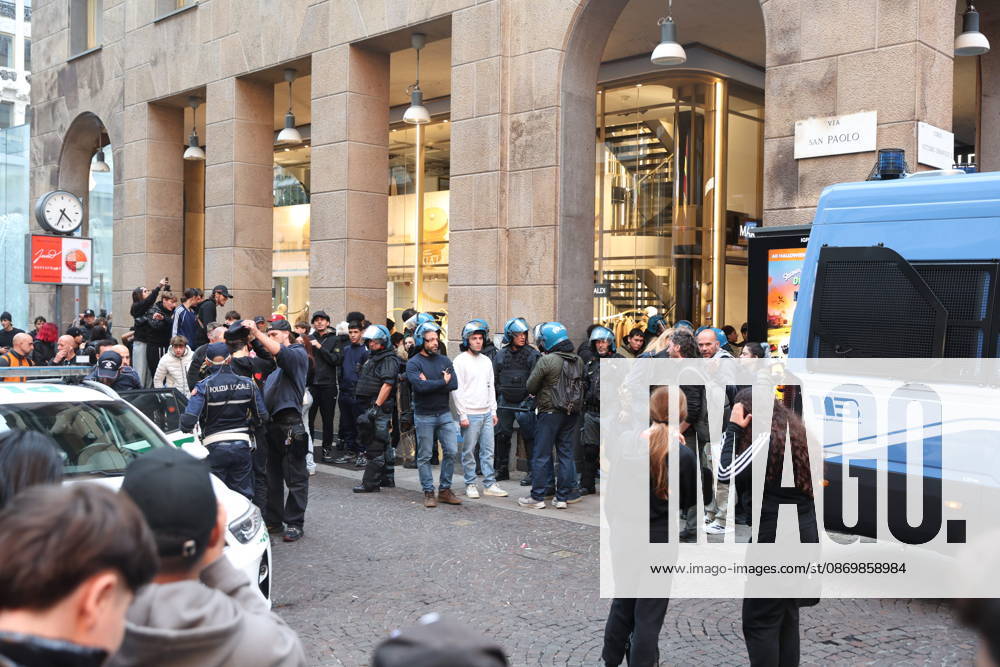 IPA89860580 - Milan: Clashes and looting by hooded youths continued in the city center the day after the demonstration on Saturday, the 17th; many hooded individuals were detained and taken to police headquarters.