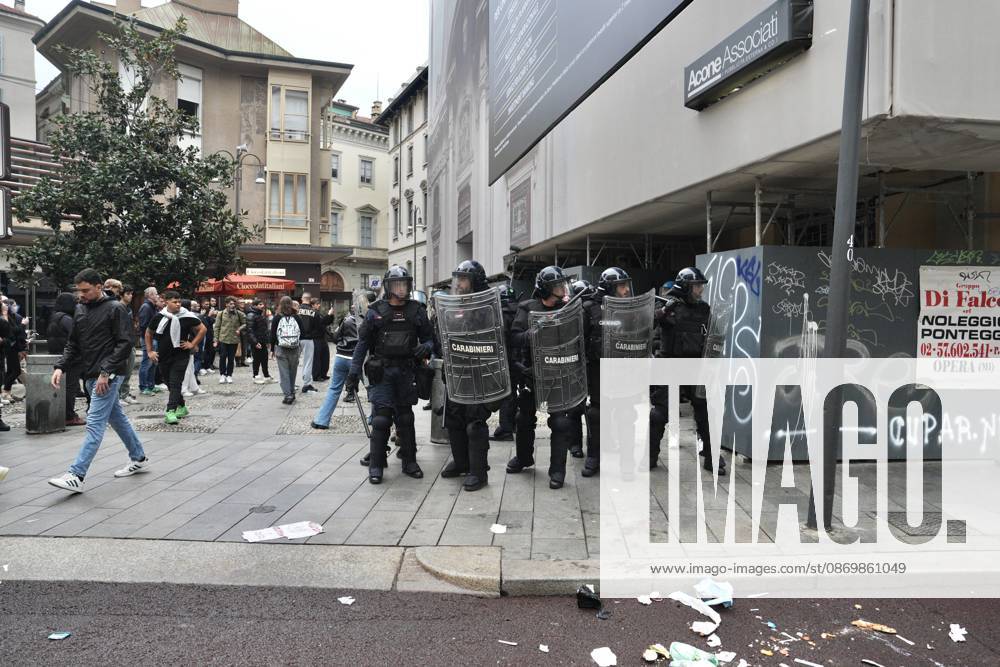 IPA89862737 - Milan: Clashes and looting by hooded youths continued in the city center the day after the demonstration on Saturday, the 17th; many hooded individuals were detained and taken to police headquarters.