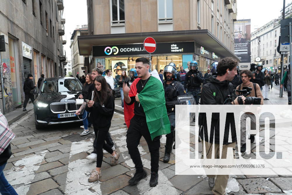 IPA89862674 - Milan: Clashes and looting by hooded youths continued in the city center the day after the demonstration on Saturday, the 17th; many hooded individuals were detained and taken to police headquarters.