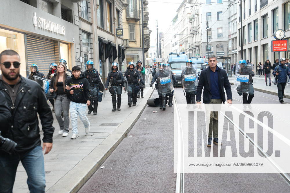 IPA89862760 - Milan: Clashes and looting by hooded youths continued in the city center the day after the demonstration on Saturday, the 17th; many hooded individuals were detained and taken to police headquarters.