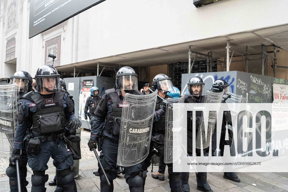 IPA89865087 - Milan: More Clashes and Looting by Hooded Youths in Downtown Milan the Day After the Protest on Saturday, the 17th