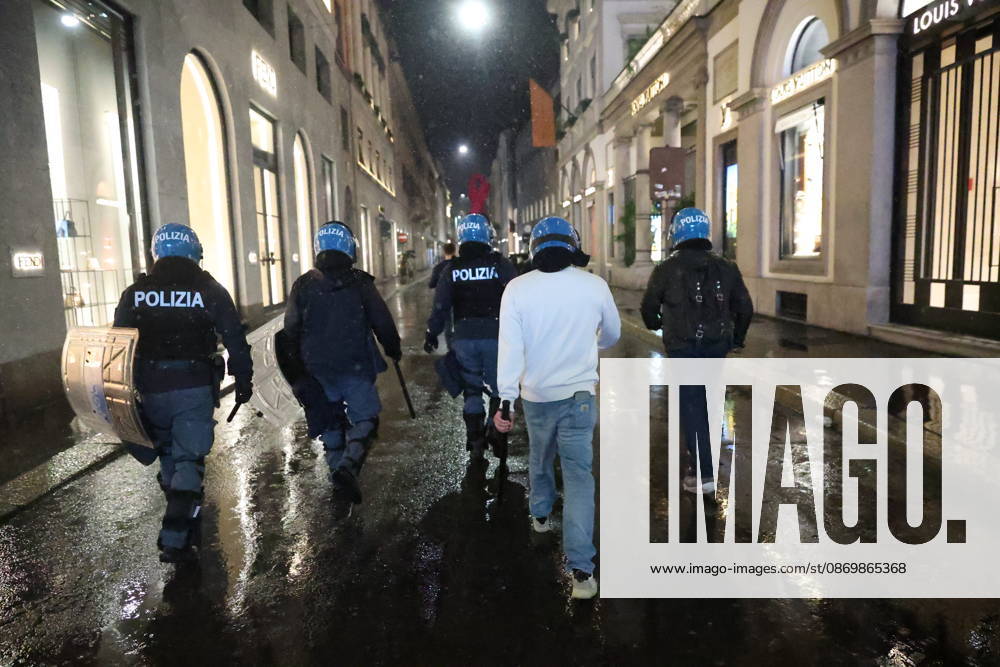 IPA89870080 - Milan: More clashes and looting by hooded youths in the city center the day after the demonstration on Saturday, the 17th; many hooded individuals were detained and taken to police headquarters