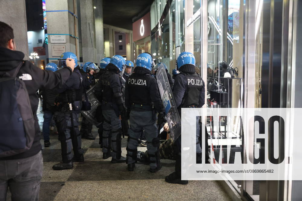 IPA89870073 - Milan: More clashes and looting by hooded youths in the city center the day after the demonstration on Saturday, the 17th; many hooded individuals were detained and taken to police headquarters