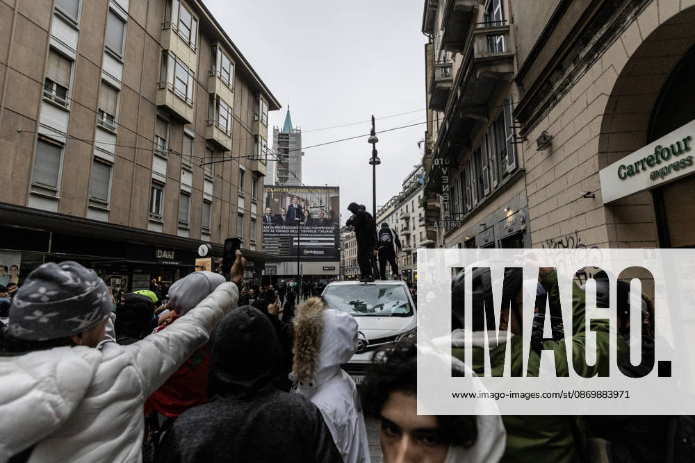 Police detain 160 as unrest continues for second day in Milan MILAN, ITALY - OCTOBER 18: Protesters vandalize a shop during protests in Milan, Italy, on October 18, 2026. Groups threw stones, bottles, firecrackers and barriers at police officers, who responded with tear gas and water cannon, while shops were damaged and looted around the city center and a Carabinieri vehicle was destroyed. Andrea Carrubba Anadolu Milan Italy. Editorial use only. Please get in touch for any other usage.