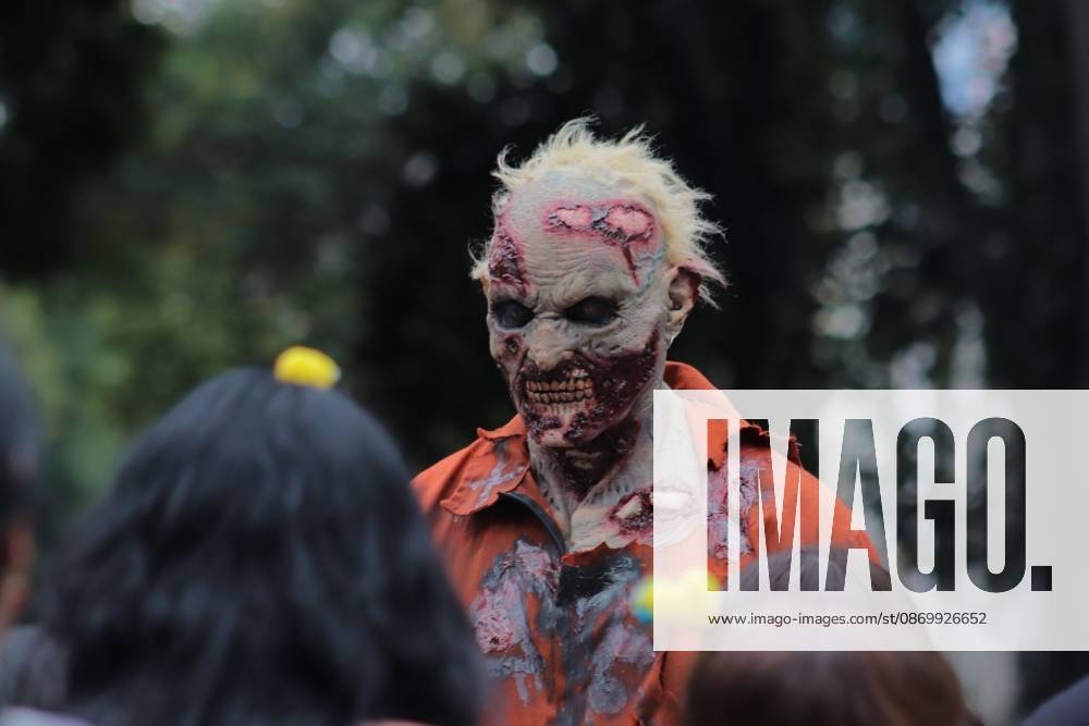19th annual Zombie Walk Mexico 2026 MEXICO CITY, MEXICO - OCTOBER 18, 2026: Participants in the 19th annual Zombie Walk Mexico 2026, dressed as the living dead, monsters, and horror characters, gather at the Monument to the Revolution in Mexico City. Mexico City Mexico
