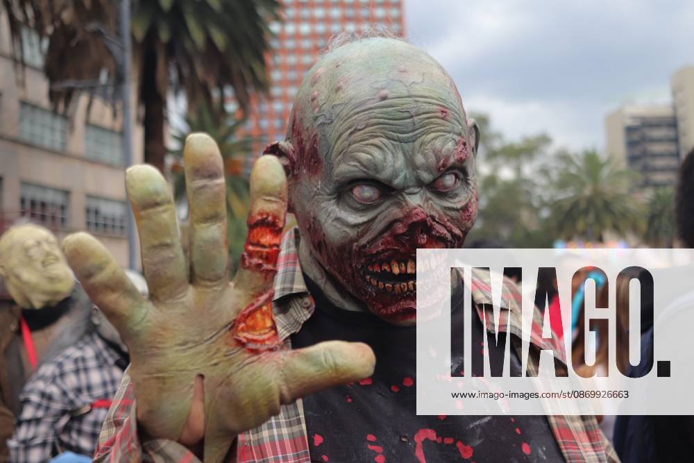 19th annual Zombie Walk Mexico 2026 MEXICO CITY, MEXICO - OCTOBER 18, 2026: Participants in the 19th annual Zombie Walk Mexico 2026, dressed as the living dead, monsters, and horror characters, gather at the Monument to the Revolution in Mexico City. Mexico City Mexico