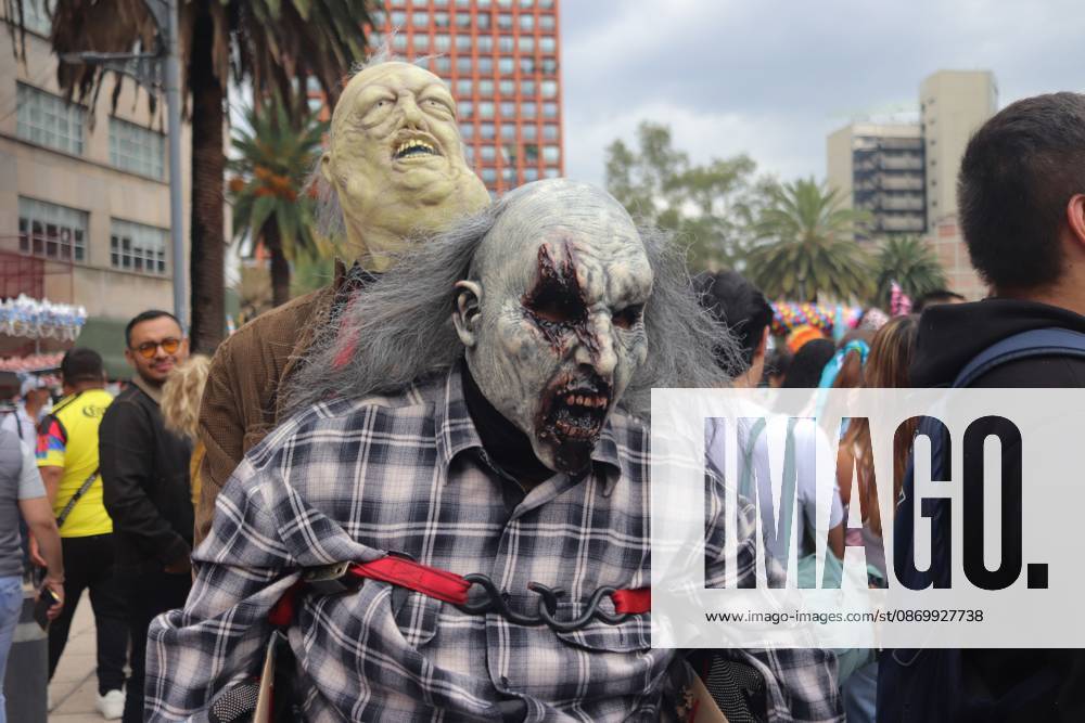 MEXICO Mexico City, MEXICO - OCTOBER 18, 2026: Participants in the 19th annual Zombie Walk Mexico 2026, dressed as the living dead, monsters, and horror characters, gather at the Monument to the Revolution in Mexico City. Mexico City Mexico - ZUMAq101 20261018_zna_q101_252