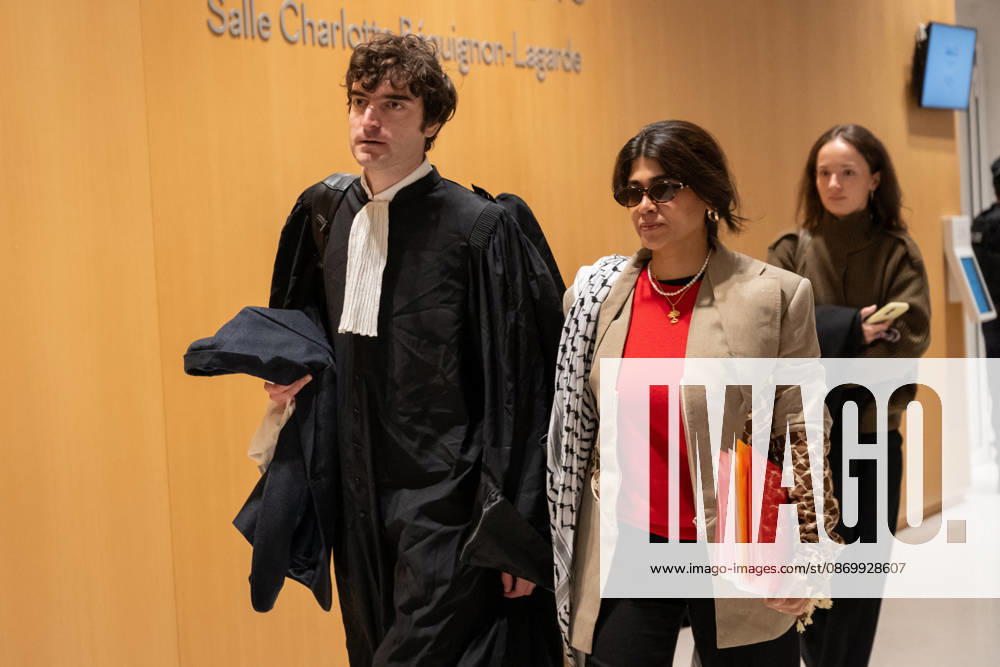Rima Hassan Trial - Paris AJ www.alexisjumeau.comMEP Rima Hassan, wearing a keffiyeh draped over her shoulders (a symbol of the Palestinian people’s struggle), accompanied by her lawyer, Maitre Vincent Brengarth, walks towards the courtroom, Trial of Rima Hassan, MEP for the La France Insoumise (LFI) movement (a left-wing opposition political party), on charges of glorifying terrorism following a tweet featuring a photograph of Kozo Okamoto repeating a message about the need for armed struggle for the Palestinian cause and Palestine’s war with Israel, in the courtroom of the Paris Criminal Court, France on October 19, 2026. Photo by Alexis Jumeau ABACAPRESS.COM Paris France