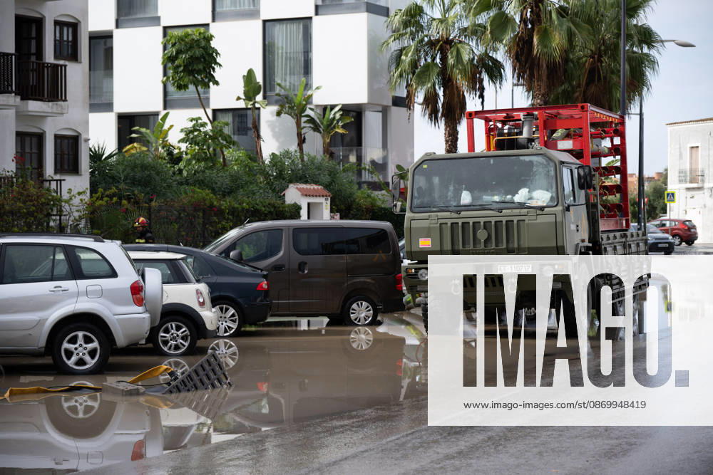 The UME is deployed in Ibiza and Mallorca to assist with incidents caused by Storm Adam. UME personnel deployed on the streets of Ibiza to mitigate the effects of Storm Adam, on October 19, 2026, in Eivissa, Balearic Islands, Spain. The Military Emergency Unit (UME) has mobilized units from its third battalion at the Valencia base to set sail for Eivissa and Mallorca. The military unit confirmed this on its social media account on platform X, with a message stating that their mission will be to collaborate with emergency services in response to incidents resulting from Storm Adam. OCTOBER 19, 2026 Germá, Spain