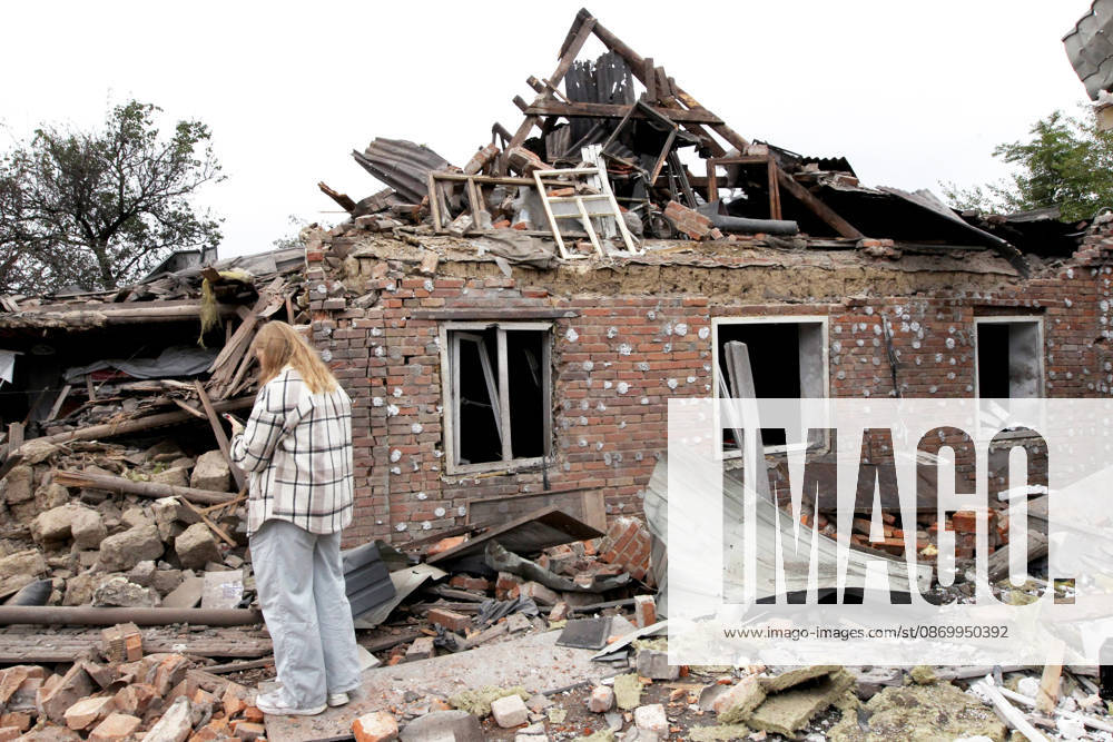A woman stands among the rubble outside a house damaged by a Russian bombardment in Dnipro, Ukraine, October 19, 2026. On Monday morning, Russian forces launched guided aerial bombs at the eastern city, damaging private homes and infrastructure. An 84-year-old woman was hospitalised in moderate condition. (Photo by Mykola Miakshykov Ukrinform) Russian troops hit Dnipro with guided bombs