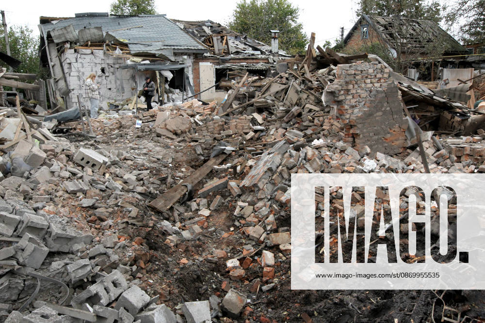 Russian troops hit Dnipro with guided bombs A man and a woman stand among the rubble near a house damaged by a Russian bombardment in Dnipro, Ukraine, October 19, 2026. On Monday morning, Russian forces launched guided aerial bombs at the eastern city, damaging private homes and infrastructure. An 84-year-old woman was hospitalised in moderate condition., Credit:Mykola Miakshykov Ukrinform Avalon Ukraine, Dnipro