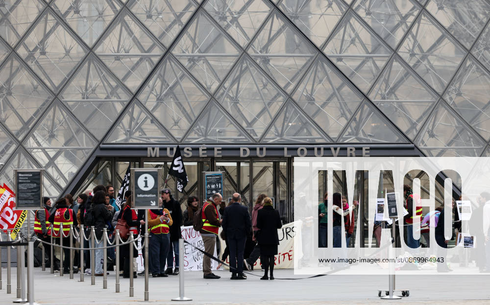(261019) -- PARIS, Oct. 19, 2026 -- Protesters gather in front of an entrance to the Louvre Museum in Paris, France, Oct. 19, 2026. In Paris, the entrance to the Louvre Museum was blocked by student protesters on Monday morning, French daily Le Parisien reported, citing the museum s management and two trade unions. According to the trade union General Confederation of Labour, the museum would remain closed at least until noon. ) FRANCE-PARIS-LOUVRE MUSEUM-PROTEST WuxHuiwo