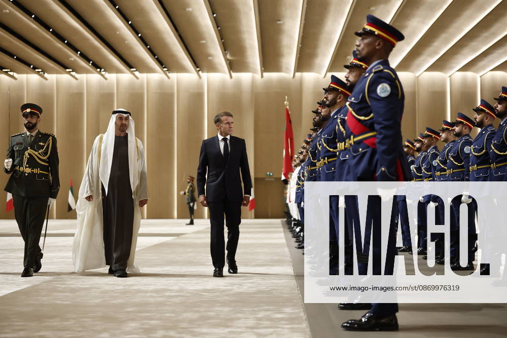 President Macron Visit To Middle East - Abu Dhabi Sheikh Mohamed bin Zayed Al Nahyan, President of the United Arab Emirates (UAE), and French President Emmanuel Macron review troops upon Macron s arrival at Zayed International Airport in Abu Dhabi, United Arab Emirates, October 19, 2026. Photo by Benoit Tessier Pool ABACAPRESS.COM Abu Dhabi United Arab Emirates